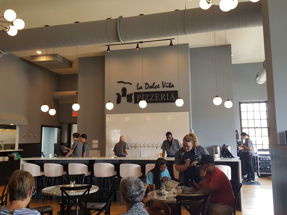 Bar and craft beer taproom seating at La Dolce Vita Pizzeria